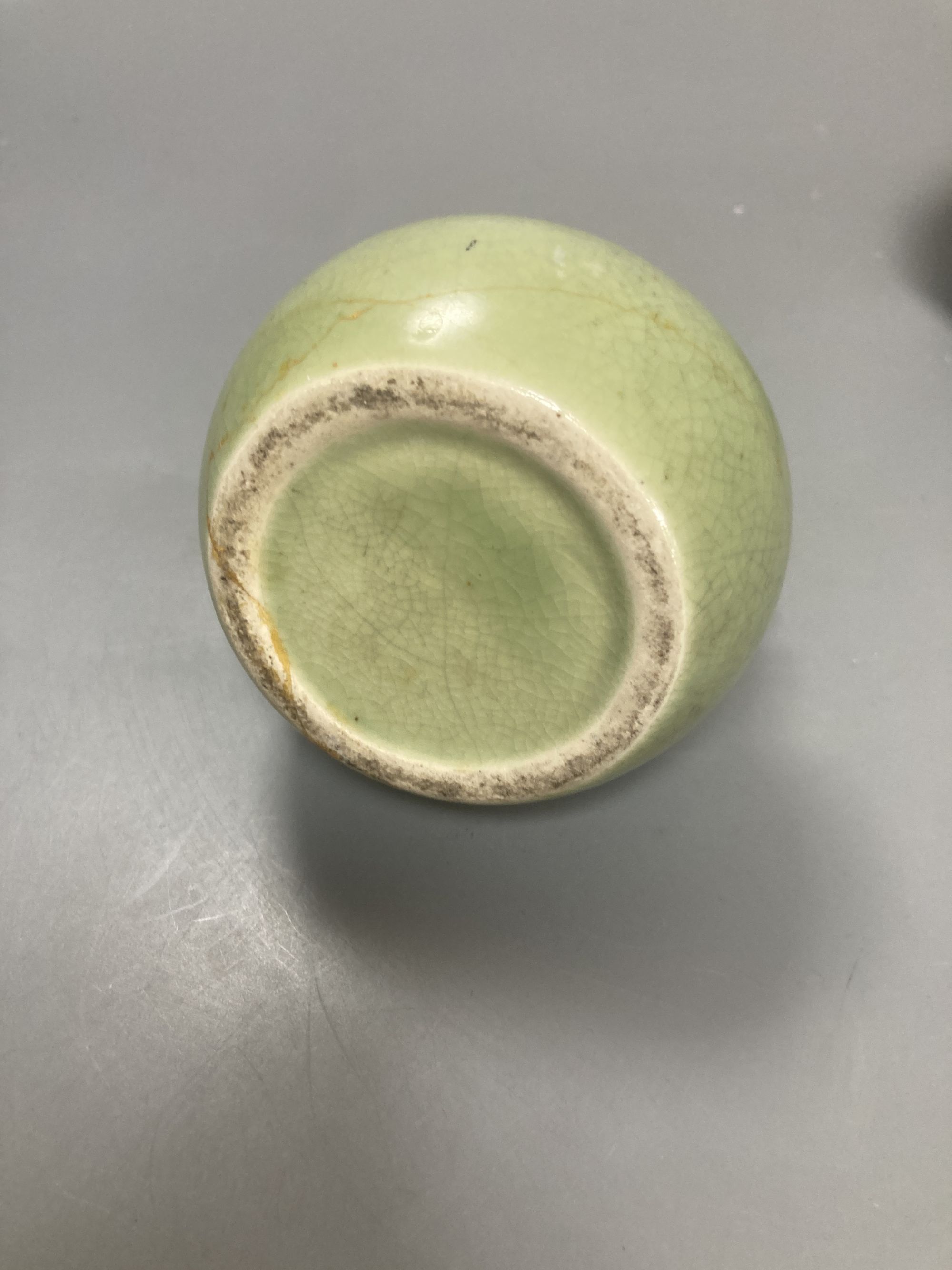 A Chinese celadon glazed water pipe and another 20cm total